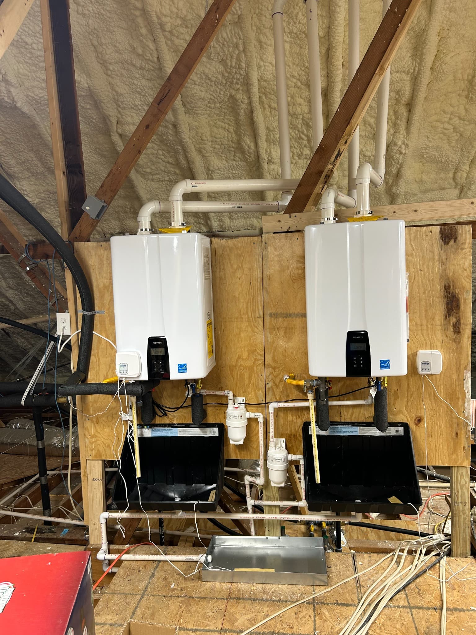 Dual tankless water heaters after completed plumbing installation
