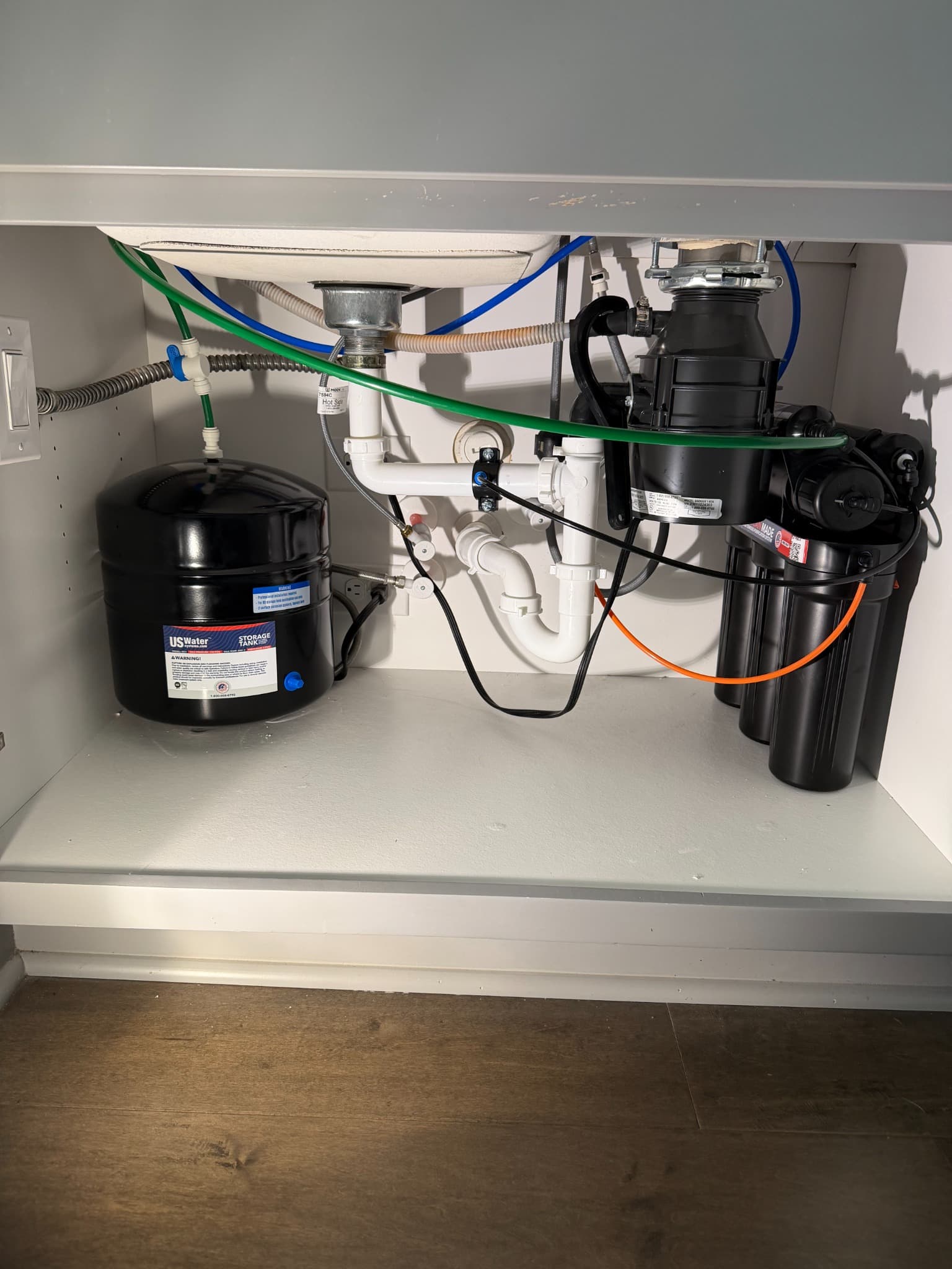 Under-sink water filtration and plumbing installation